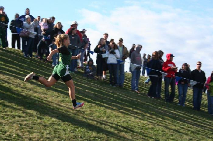 Lilly flies down the final hill to the finish line