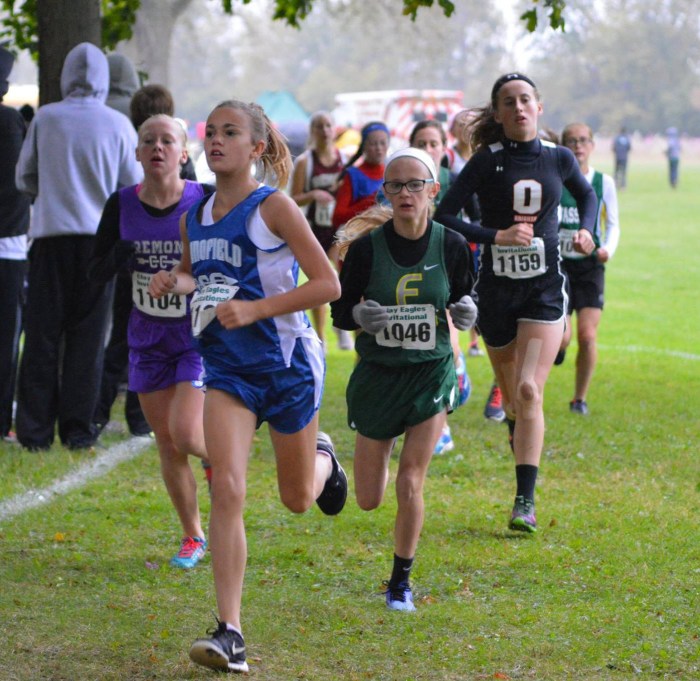 Kennedy keeps pace on the way to a new girls middle school record.