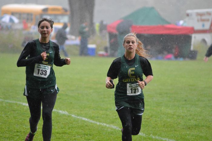Leah and Lilly, soaked to the bone and nearing the finish