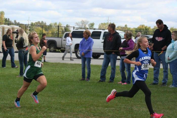 Lilly chases down one last runner on her way to a lifetime PR